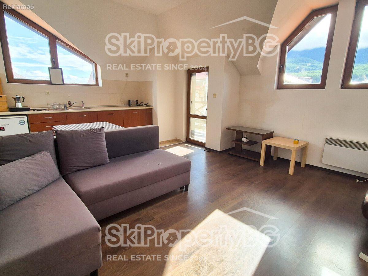 BA1108 - Two-room apartment with fireplace and parking space.