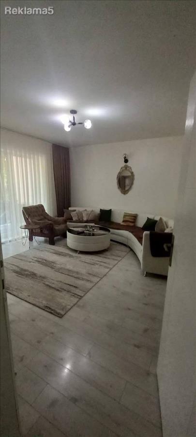 Three-room apartment with patio and unlimited parking