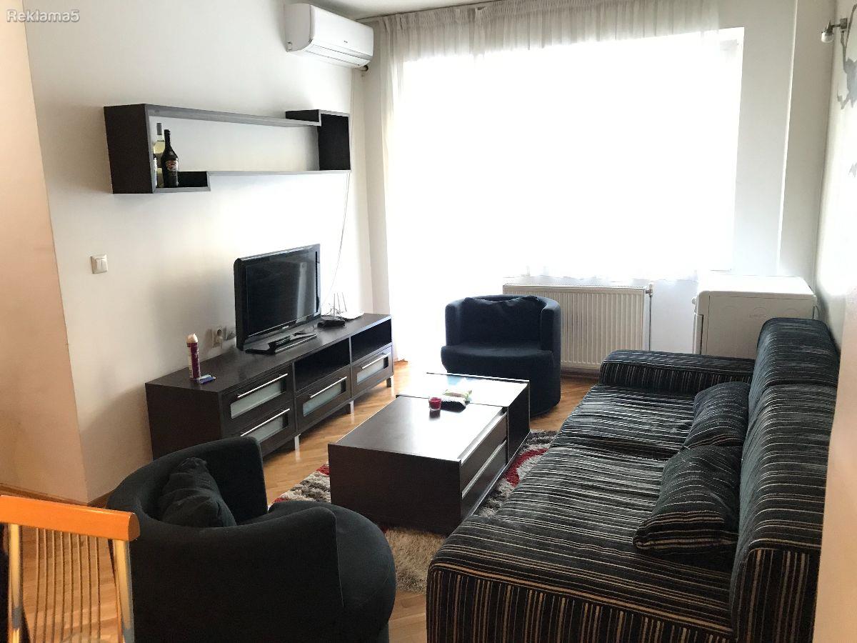 A three-room apartment 48m² and a Catholic church are for sale