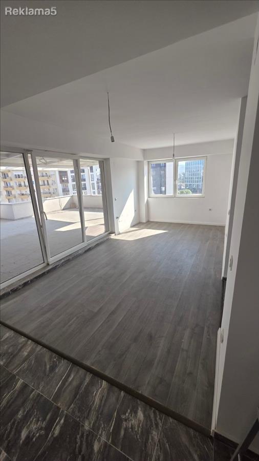 A 53m2 apartment with a 75m2 terrace behind the Mercedes service center is for sale