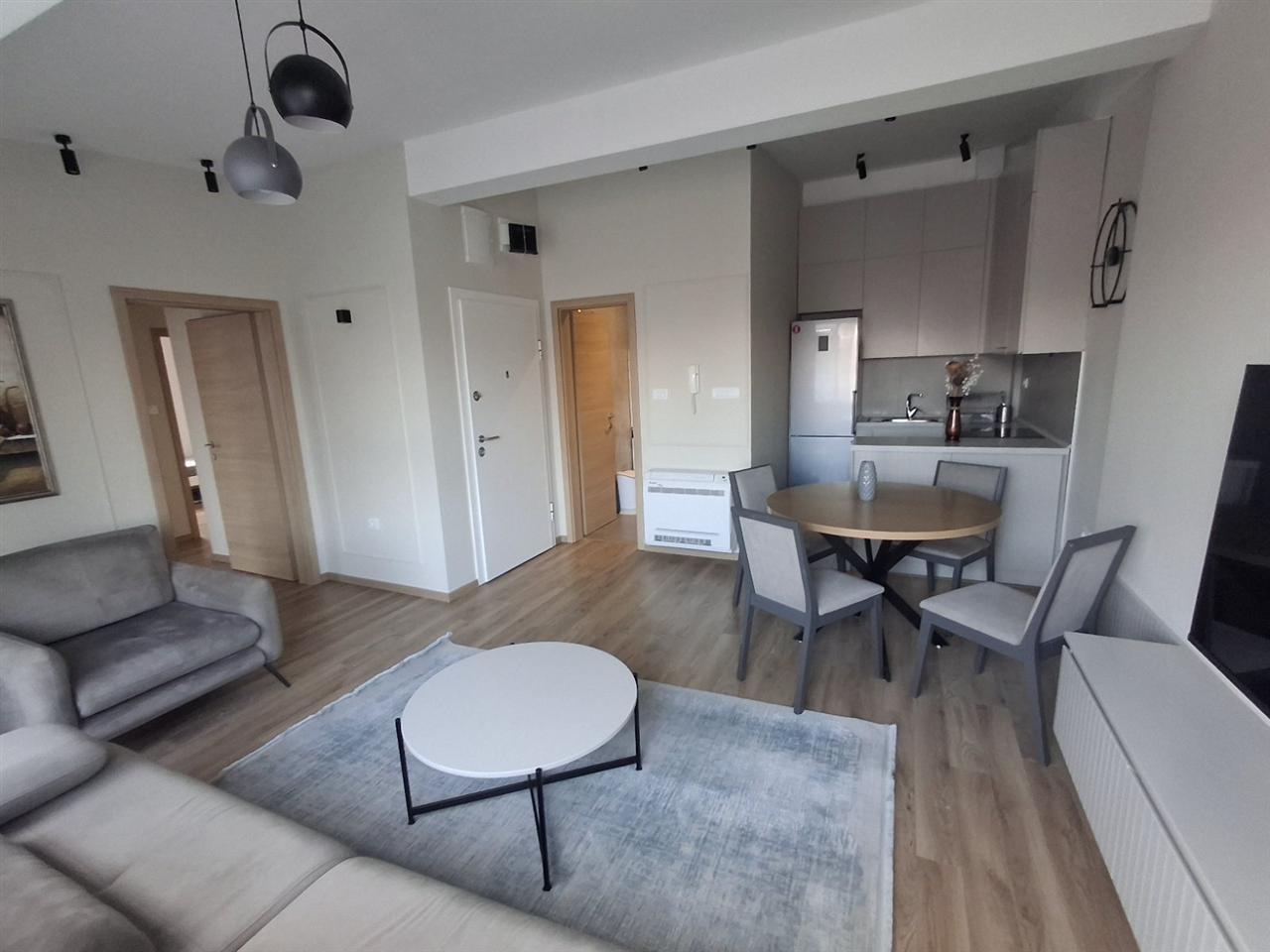 A new, modernly furnished apartment is for rent