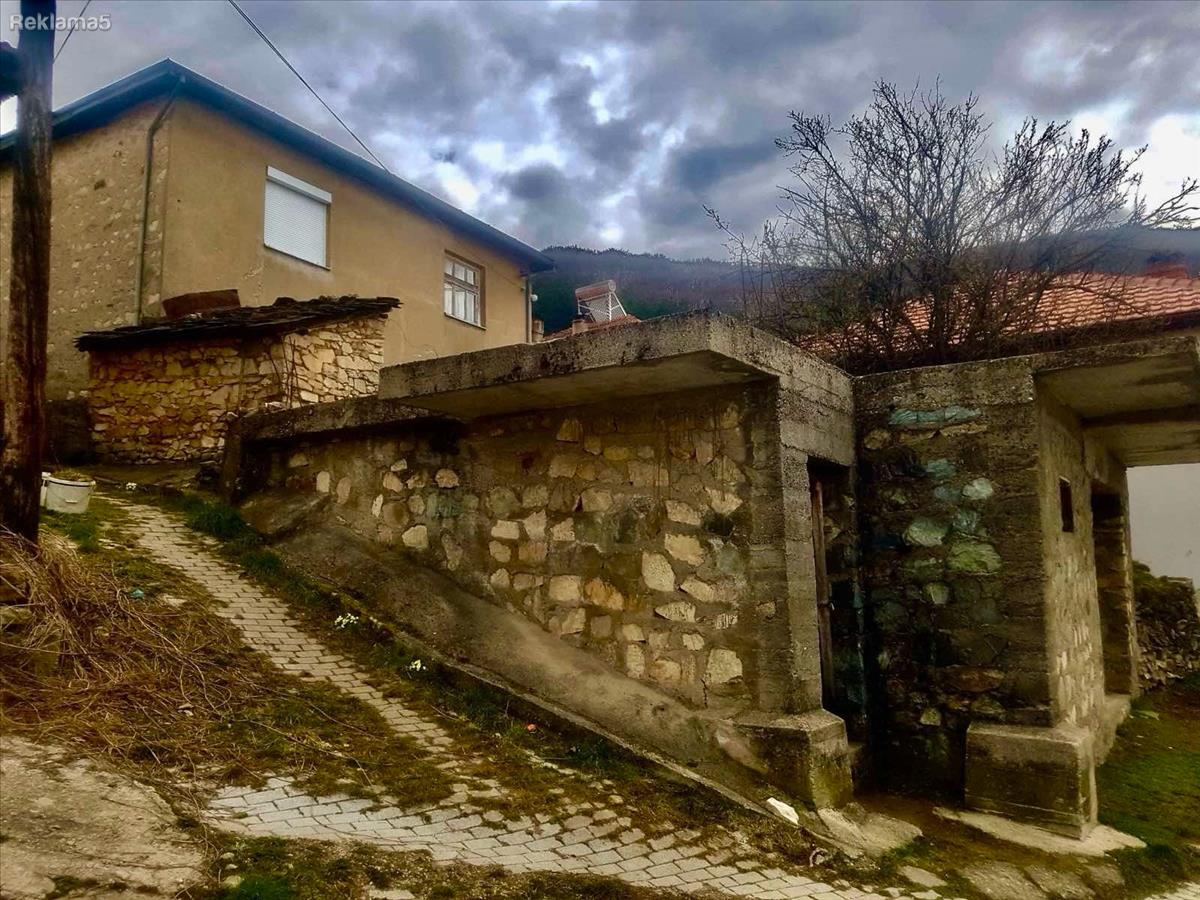 For sale is a house and land up to the first plat