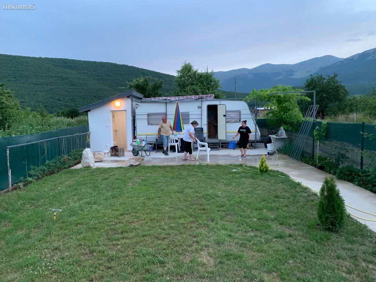 A plot with a caravan is for sale in the village of Stenje