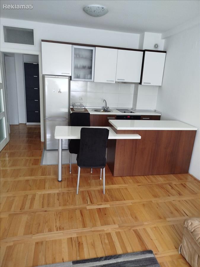 A studio apartment for rent in the center near an old church