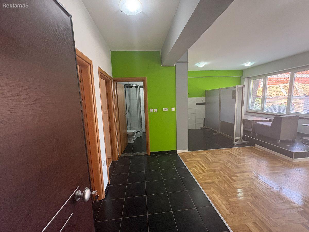 An apartment furnished as an office in the Center is for rent
