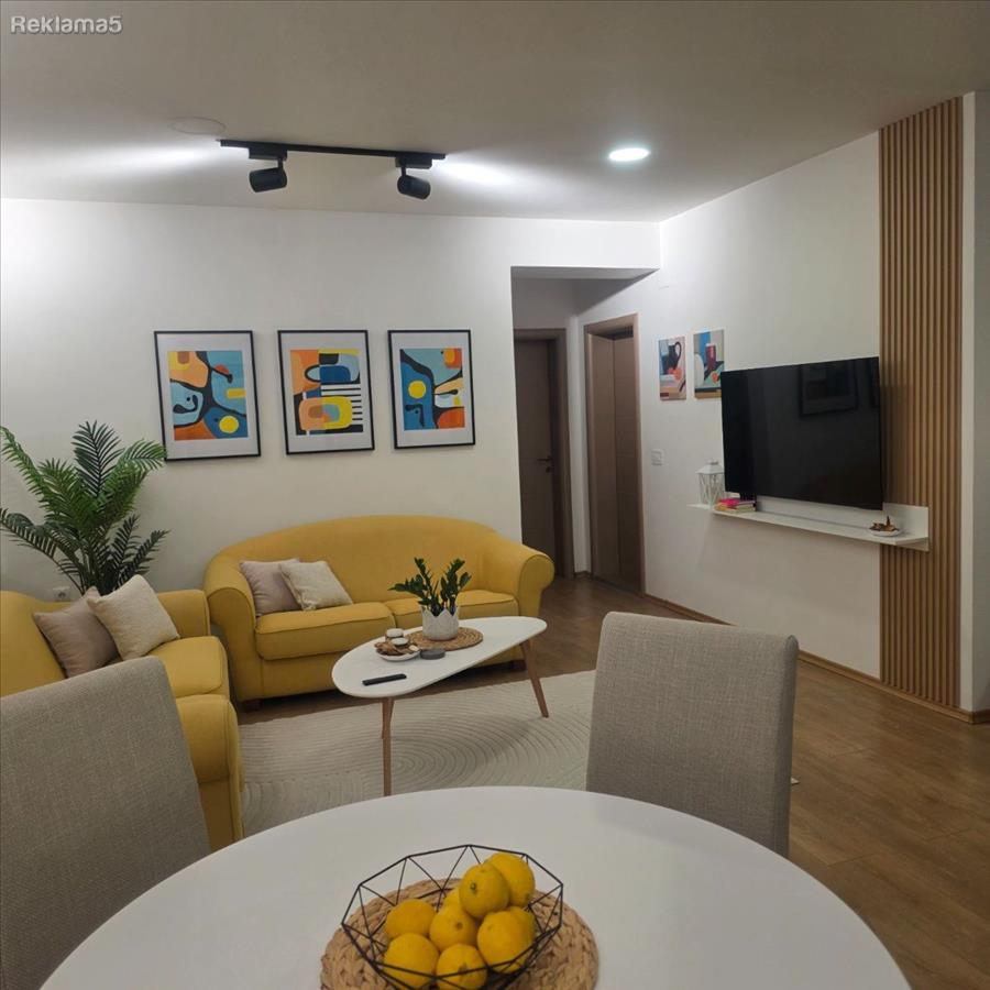 A three-room apartment in the center is for rent